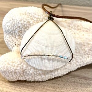 49. Handmade Antigua seashell necklace with iridescent beads and copper wiring